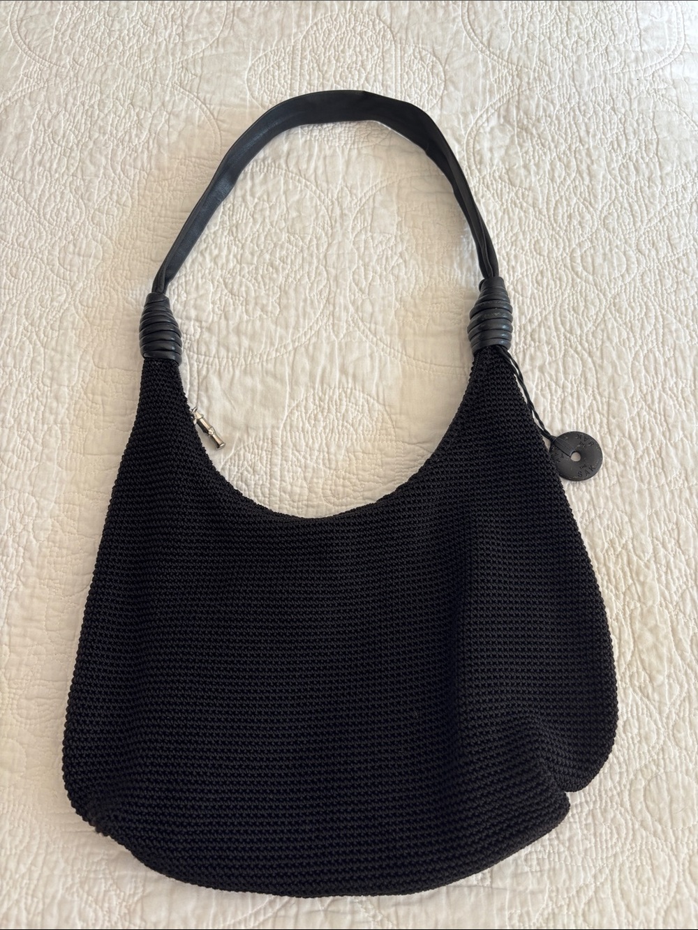 The Sak black crochet bag with leather handle.